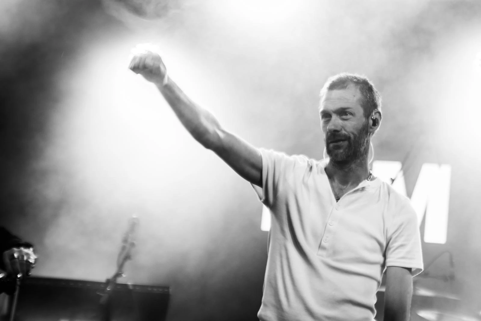 Tom Meighan live, fist raised